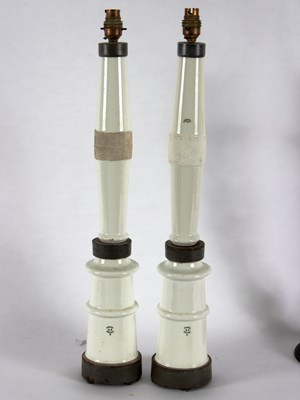 Lot 526 - A pair of porcelain column lamp bases, marked...