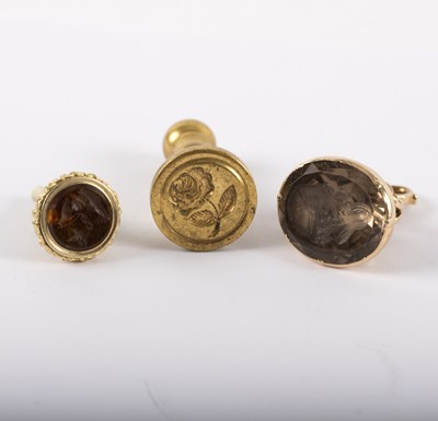 Lot 1131 - Three various seal fobs, to include two yellow...