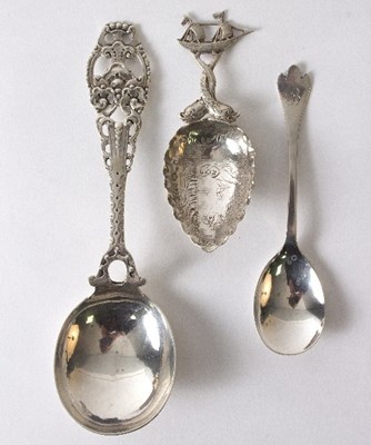 Lot 54 - A silver caddy spoon, import marks T H, London...
