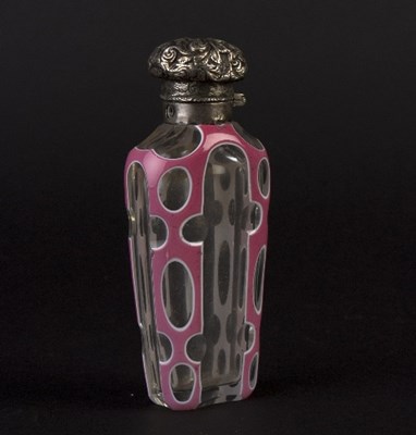 Lot 174 - A glass and pink enamel scent bottle with...