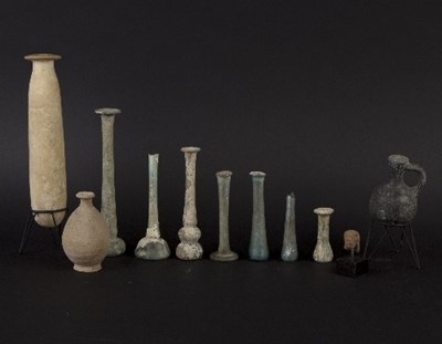 Lot 178 - Seven Roman glass bud vases, the tallest 18cm...