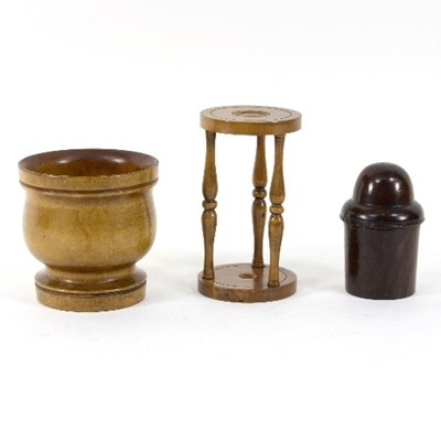 Lot 387 - A turned wooden mortar, a lignum bottle holder...