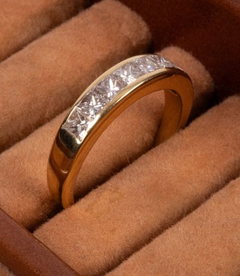 Lot 50 - An 18ct yellow gold and diamond half-eternity ring