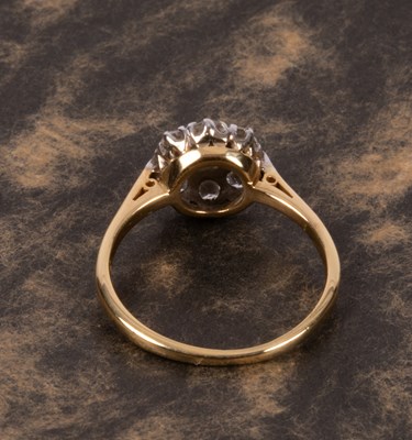 Lot 63 - An 18ct yellow gold and diamond flower head cluster ring