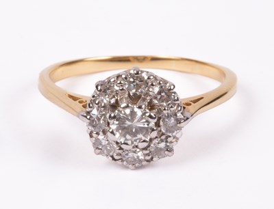 Lot 63 - An 18ct yellow gold and diamond flower head cluster ring