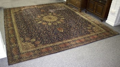 Lot 1194 - A modern machine made rug of Eastern design,...