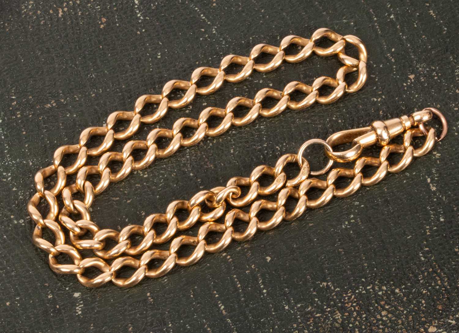 Lot 51 - An 18ct yellow gold curb link watch chain