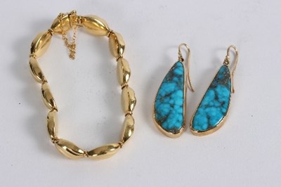 Lot 194 - An 18ct gold bracelet, approximately 16gm and...