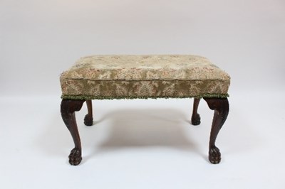 Lot 363 - A George II style stool with upholstered seat...