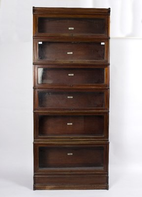 Lot 38 - A Globe Wernicke mahogany sectional bookcase...