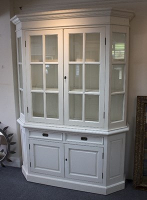 Lot 67 - A painted display cupboard by Oka, the shelved...