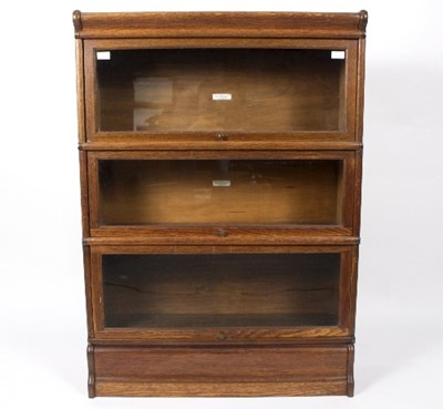 Lot 73 - An oak Globe Wernicke bookcase of three...