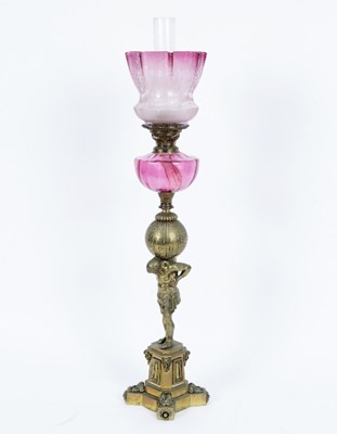 Lot 99 - A gilt brass oil lamp, modelled as Atlas with...