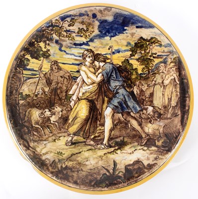 Lot 179 - A 19th Century majolica charger, painted a man...