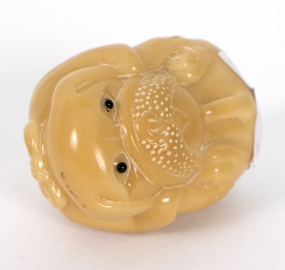 Lot 288 - A vegetable ivory carved netsuke, modelled as...