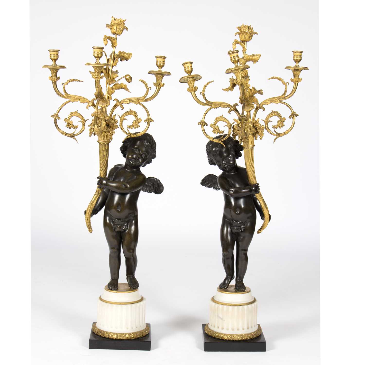 Lot 978 - A pair of mid 19th Century ormolu three-branch...