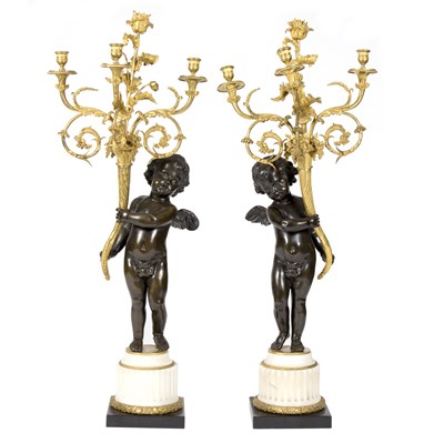 Lot 978 - A pair of mid 19th Century ormolu three-branch...