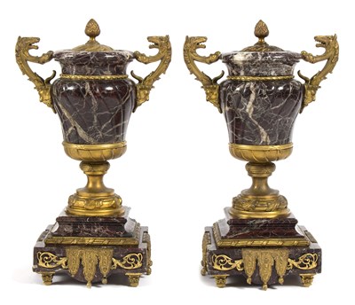 Lot 1009 - A pair of marble and gilt metal garniture...