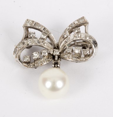 Lot 126 - A diamond and cultured pearl bow brooch, the...