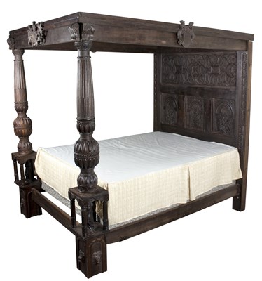 Lot 515 - A four-poster bed in the Tudor style, the...