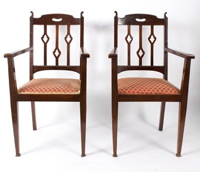 Lot 544 - A pair of Arts & Crafts style open armchairs
