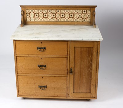 Lot 728 - A pine cabinet fitted three drawers and a...