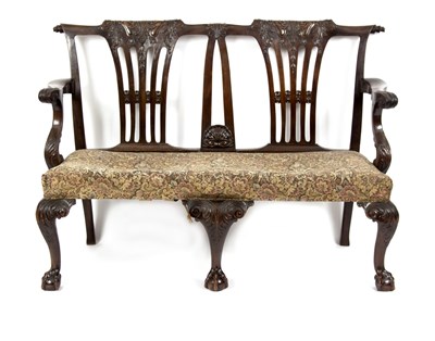 Lot 746 - An Irish mahogany two-chair back settee of...