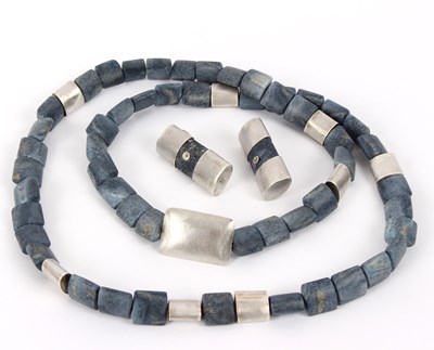 Lot 4 - Barbara Christie, a blue coral and textured...
