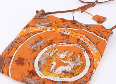 Lot 26 - Hermes, a 'SilkyCity' handbag, the silk scarf...