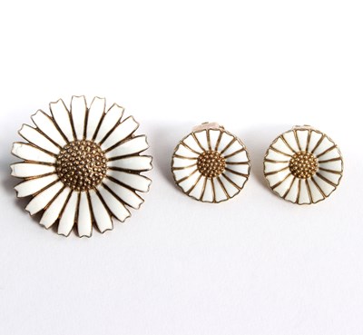 Lot 29 - Georg Jensen, an enamel and silver daisy...