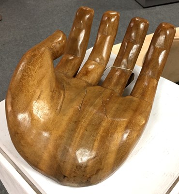 Lot 76 - A carved wooden human open hand, 37cm wide