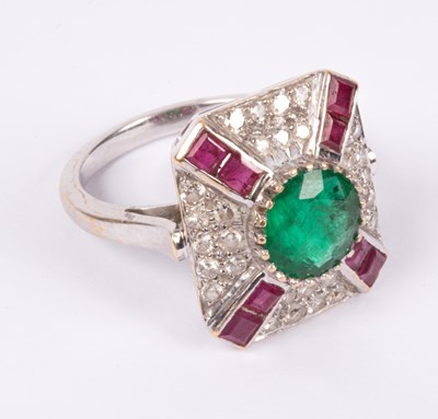 Lot 95 - An 18ct white gold, emerald, ruby and diamond ring