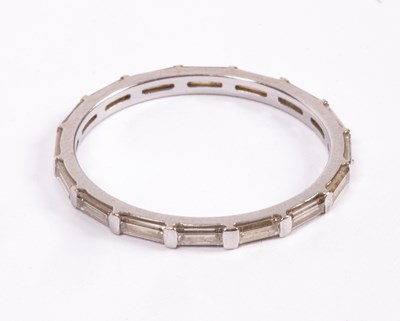 Lot 102 - A diamond eternity ring