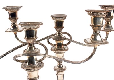 Lot 2 - A pair of Sheffield plate candlesticks with...