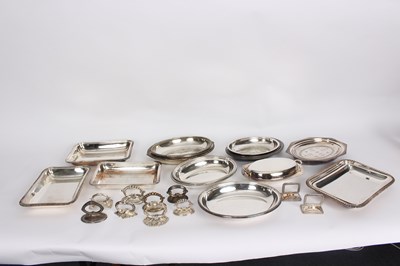 Lot 4 - A collection of plated entree dishes and covers