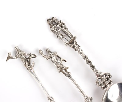 Lot 9 - Three Dutch silver spoons each with decorative...
