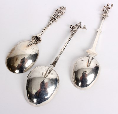 Lot 9 - Three Dutch silver spoons each with decorative...