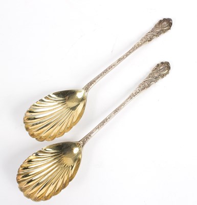 Lot 23 - A pair of silver serving spoons, George...