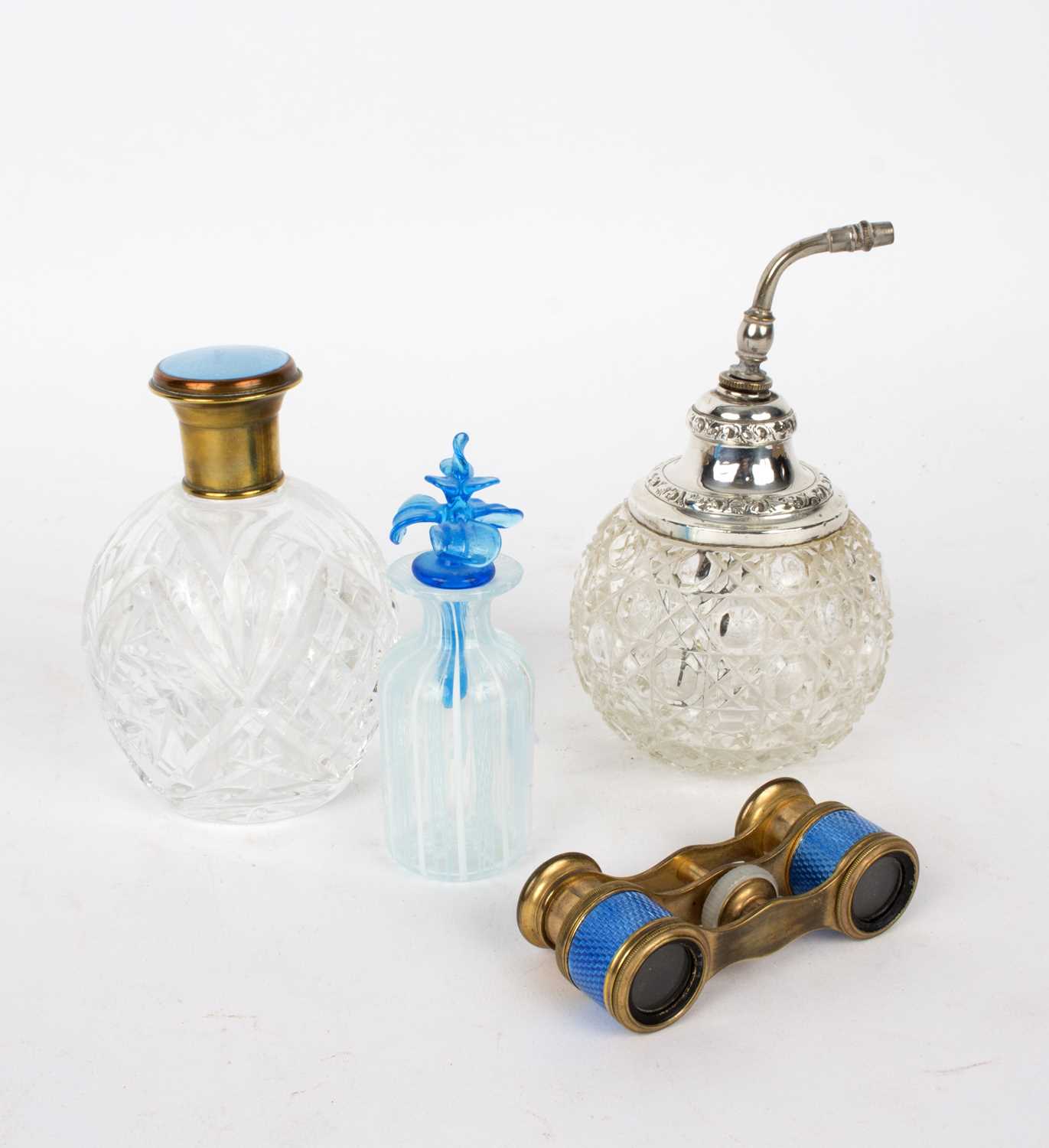 Lot 27 - A cut glass scent bottle with silver mounts, a...