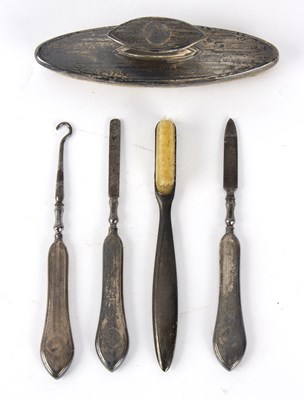 Lot 61 - A small group of silver including nail buffer,...