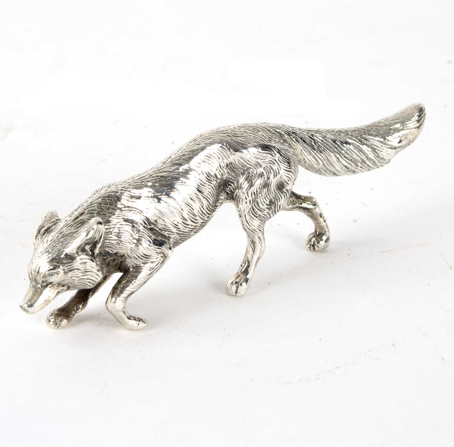 Lot 68 - A silver model of a prowling fox, marked...