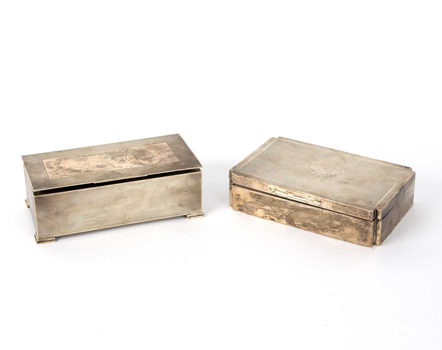 Lot 88 - An Art Deco silver cigarette box, H. Bros,...