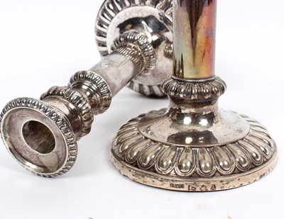Lot 90 - A pair George III silver candlesticks, John...