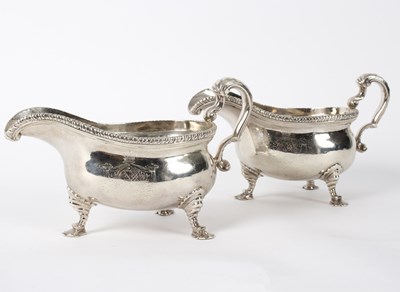 Lot 98 - A pair of George II silver sauce boats, makers...