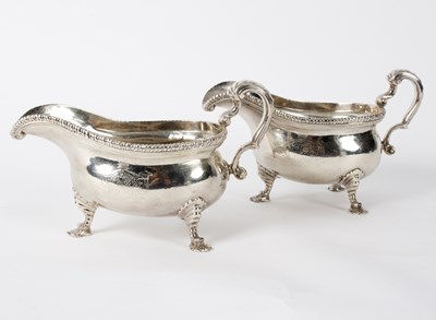 Lot 98 - A pair of George II silver sauce boats, makers...
