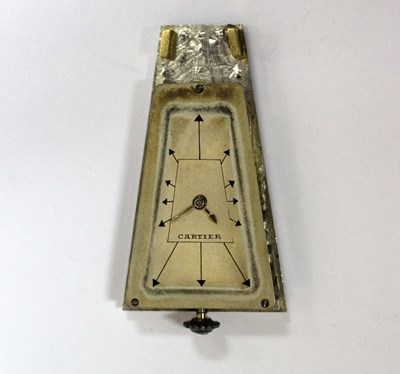 Lot 275 - A Cartier 'Egyptian' onyx and diamond lapel...