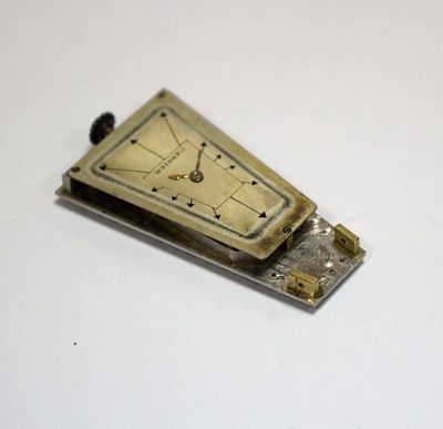 Lot 275 - A Cartier 'Egyptian' onyx and diamond lapel...