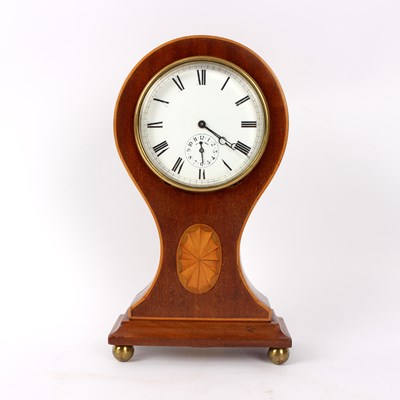 Lot 776 - An Edwardian mahogany eight-day alarm mantel...