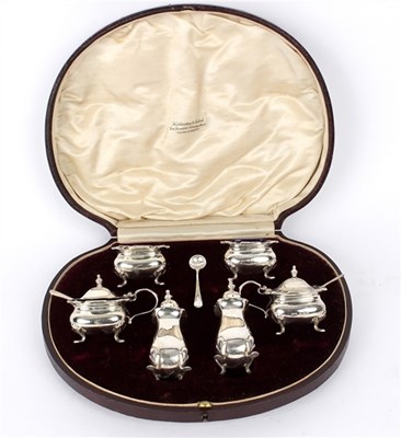 Lot 43 - Two silver mustard pots, two silver salt...