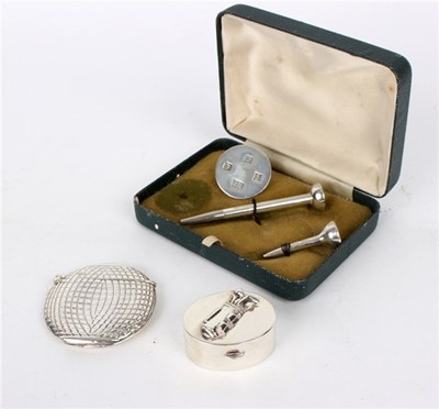 Lot 58 - A novelty vesta case of golf ball form,...